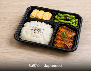 Japanese bento box with ginger teriyaki chicken, pearl rice with black sesame, kombu edamame and tamagoyaki. Cuseho Asian fusion bento catering, Singapore