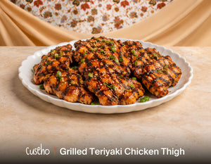 Grilled teriyaki chicken thighs with toasted sesame and spring onion. Cuseho Asian fusion mini buffet catering, Singapore