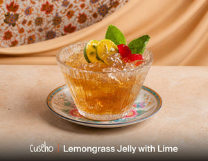 Lemongrass jelly with calamansi lime slices and cherry garnish. Cuseho Asian fusion mini buffet catering, Singapore
