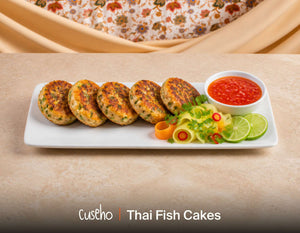 Thai fish cakes with sweet chilli dip, ribbon salad and lime. Cuseho Asian fusion mini buffet catering, Singapore