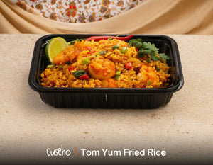 Tom yum fried rice with prawns, red chilli and lime in a black catering tray. Cuseho Asian fusion mini buffet catering, Singapore