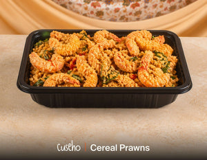 Cereal prawns with curry leaves and chilli in a black catering tray. Cuseho Chinese fusion mini buffet catering, Singapore
