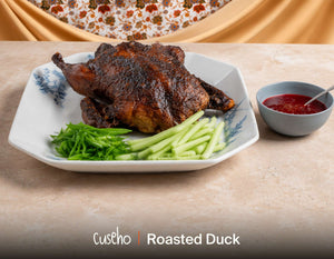 Whole roasted duck with cucumber, spring onion and tangy plum sauce. Cuseho Chinese fusion mini buffet catering, Singapore