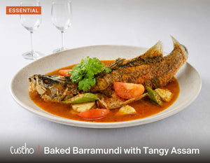 Baked Barramundi with Tangy Assam, whole barramundi in tangy tamarind assam gravy, okra, tomato, pineapple. Cuseho Local Delight buffet catering, Singapore