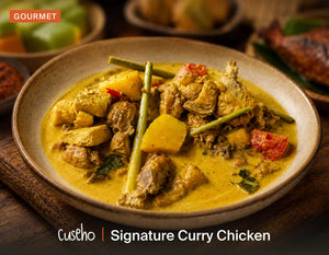 Signature Curry Chicken, chicken in rich coconut curry gravy, soft potatoes, lemongrass, curry leaves. Cuseho Local Delight buffet catering, Singapore