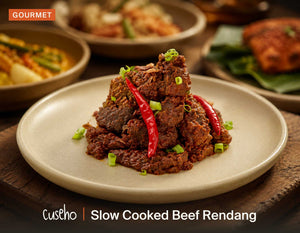 Slow Cooked Beef Rendang, beef slow braised in toasted coconut rempah, red chili, spring onion. Cuseho Local Delight buffet catering, Singapore
