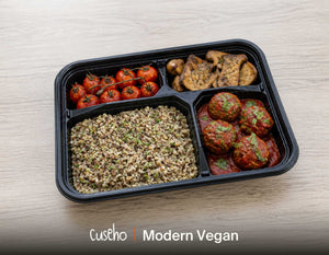 Modern Vegan bento box with plant based meatballs in tomato sauce, tri colour quinoa, king oyster mushrooms and roasted cherry tomatoes. Cuseho Modern Western bento catering, Singapore