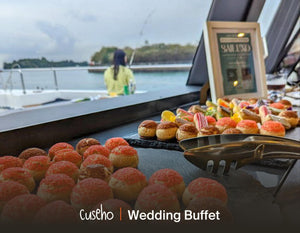 Choux pastry and eclair dessert spread served on deck with a sea view. Cuseho wedding and gala buffet catering, Singapore