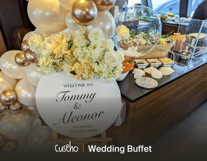 Wedding welcome dessert station with white roses, balloons and fresh oysters. Cuseho wedding and gala buffet catering, Singapore