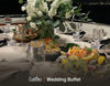 Elegant wedding dinner table with white roses, canapes and a fresh seafood platter on a yacht at night. Cuseho wedding and gala buffet catering, Singapore