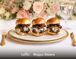 Wagyu beef sliders with melted cheese and caramelized onions. Cuseho wedding and gala buffet catering, Singapore